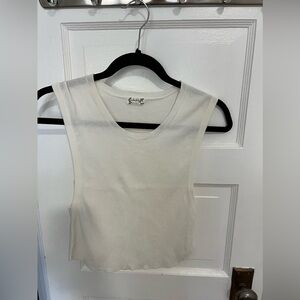 Free people crop top. Nice knit ribbed fabric. Semi sheer.